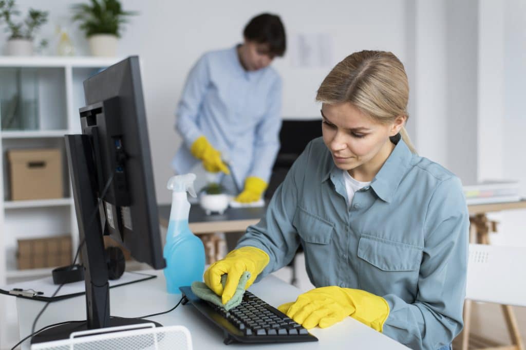 people taking care of office cleaning 1 scaled